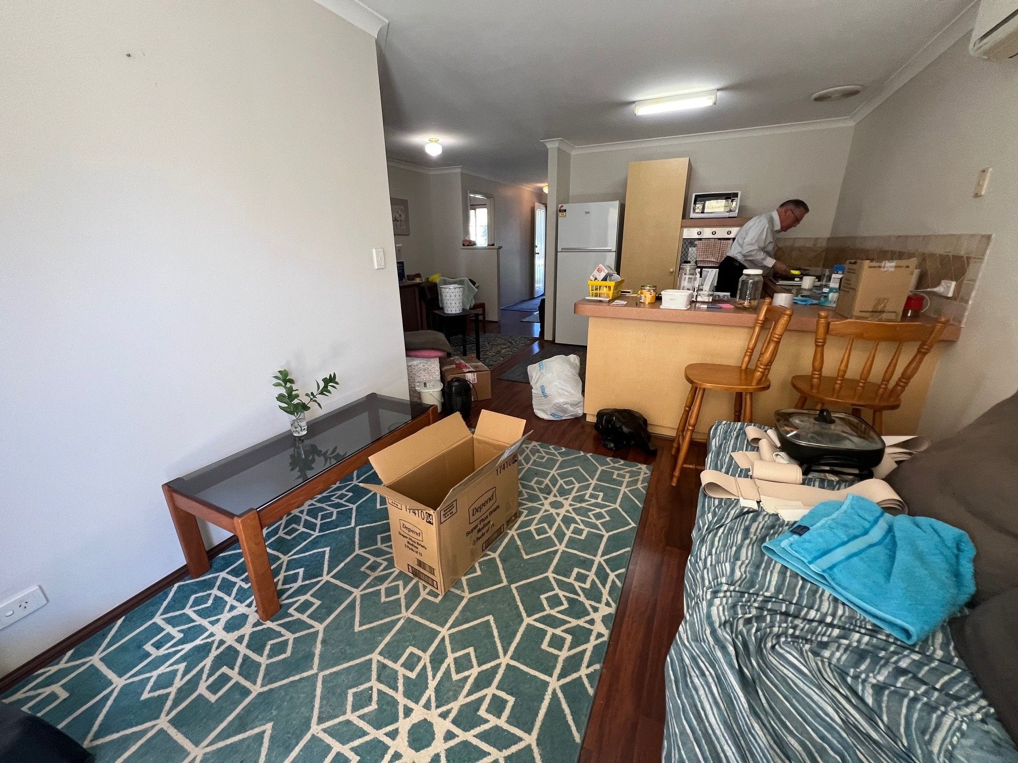 Kitchen and lounge, before